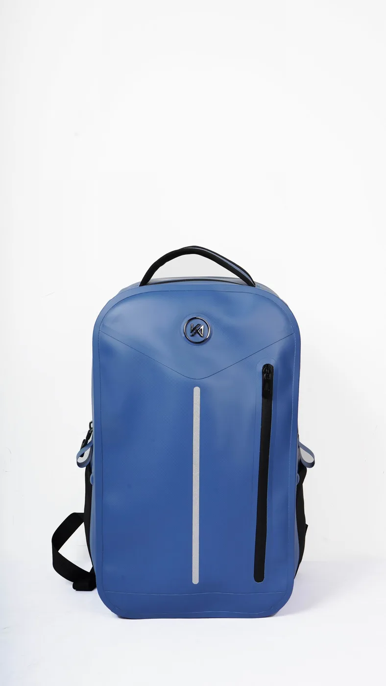 Blue roll-top dry bag backpack used as a camera carry
